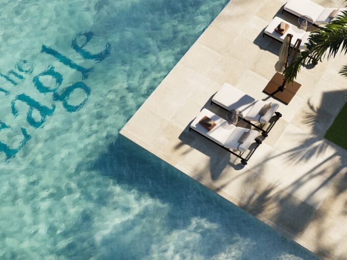 Aerial view of the infinity pool and gardens at The Eagle Residences, Mijas