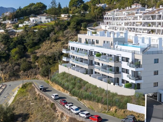 The block seen from the approach road at Aeli Mijas, Mijas Pueblo
