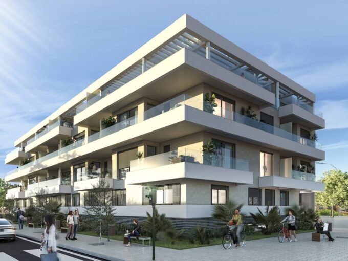 Daytime view of the contemporary white facade and landscaped street frontage at Almara Residences, Rincón de la Victoria