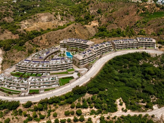Aerial view of the development on the hillside at Evoque Residences, El Higueron, Fuengirola