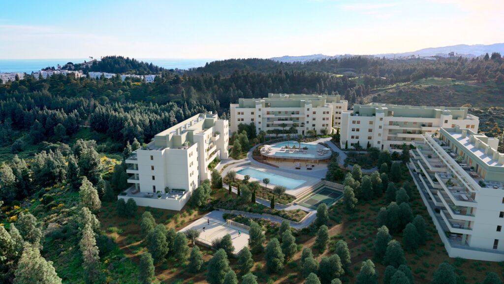 Aerial view of the blocks and communal pools at Greenity, Mijas