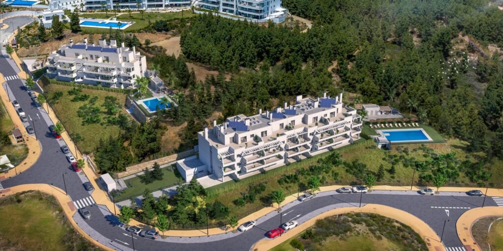 Aerial view of the Sunrise development and pools in El Chaparral, Mijas Costa