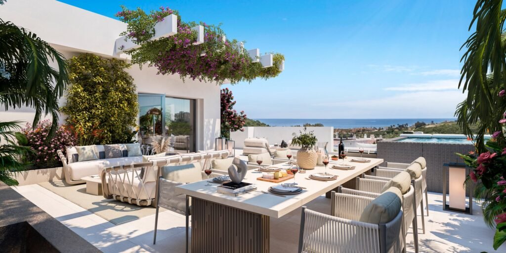 Large terrace with outdoor dining area and pergola at Amaranta Living, Casares