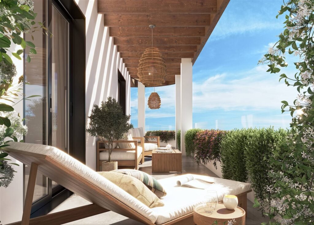 Covered terrace with outdoor lounge at Laguna Nova, Las Lagunas de Mijas