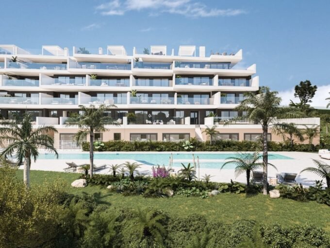 Communal pool and gardens in front of the buildings at Pure Sun II, Manilva