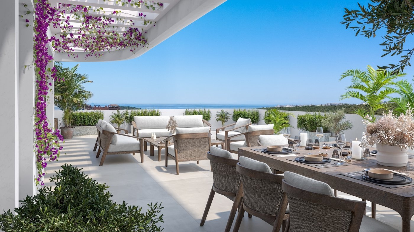Terrace dining area with sea views at Skye Casares Golf, Casares